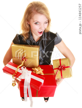 holidays love happiness concept - girl with gift boxes holidays love happiness concept - girl with gift boxes 114841257