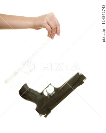 Woman lawyer with gun bag marked evidence for crime. Woman lawyer with gun bag marked evidence for crime. 114841742