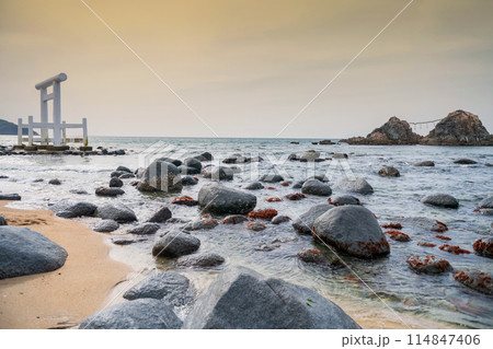 Torii gate, Sakurai Futamigaura couple stones at sunset, Itoshima 114847406