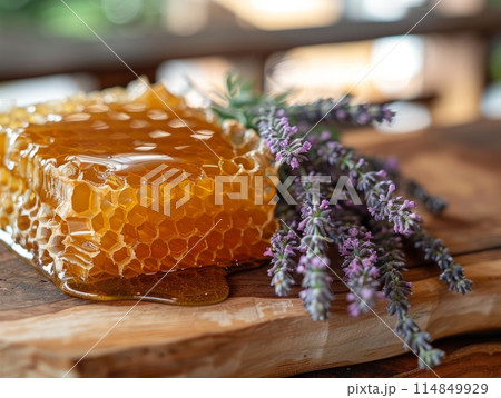 Organic Honey and Lavender on Wooden Surface 114849929
