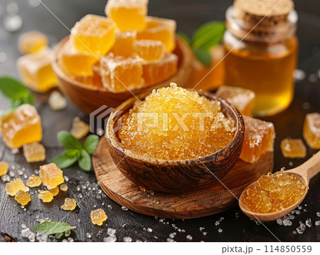 Yellow bowl filled with sweet honey, ready for dipping 114850559