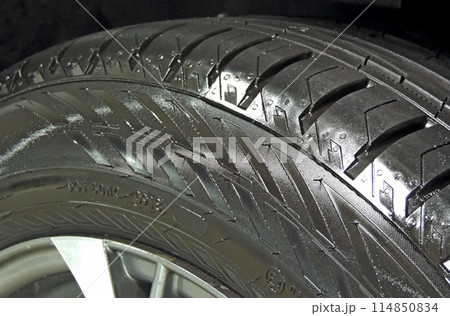 Sidewall of car tire after rubber cleaner treatment detailed  114850834