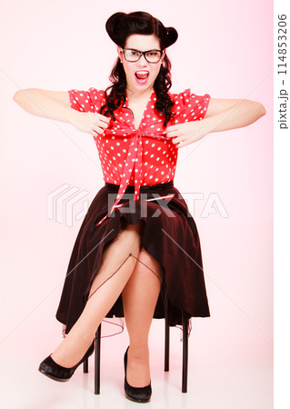 Retro. Angry pinup girl in eyeglasses screaming Retro. Angry pinup girl in eyeglasses screaming 114853206