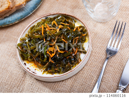 Sea kale salad with carrots served in bowl Sea kale salad with carrots served in bowl 114860116
