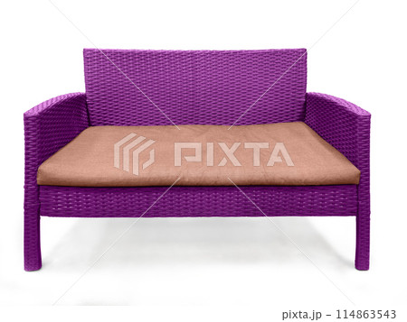 Purple rattan sofa with light orange cushions on a white background 114863543