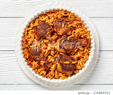 baked greek chicken orzo stew in tomato sauce 114864531