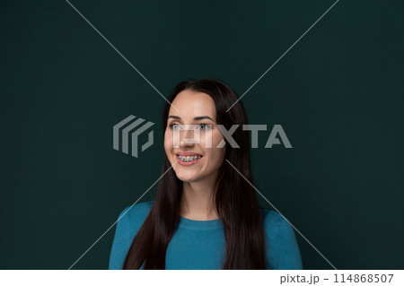 Smiling Woman in Blue Top 114868507
