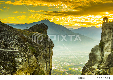 Sunset over Varlaam monastery in Meteora, Greece 114868684