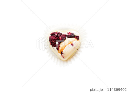 top view of chocolate pralines in heart form isolated on white background top view of chocolate pralines in heart form isolated on white background 114869402