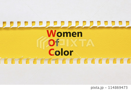 WOC women of color symbol. Concept words WOC women of color on beautiful yellow paper. Beautiful white paper background. Business WOC women of color social issues concept. Copy space. WOC women of color symbol. Concept words WOC women of color on beautiful yellow paper. Beautiful white paper background. Business WOC women of color social issues concept. Copy space. 114869473