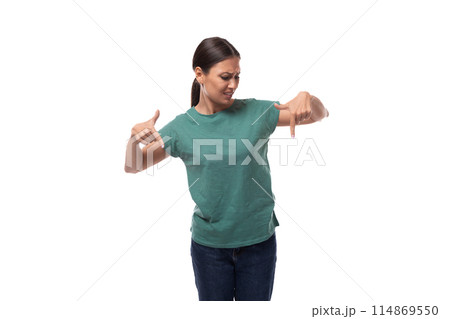 charming cute friendly slender young brunette woman dressed in a green t-shirt attracts attention charming cute friendly slender young brunette woman dressed in a green t-shirt attracts attention 114869550