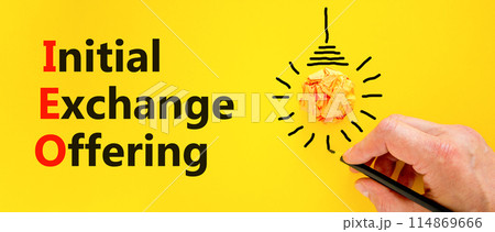 IEO initial exchange offering symbol. Concept words IEO initial exchange offering on beautiful yellow paper. Beautiful yellow background. Business IEO initial exchange offering concept. Copy space. IEO initial exchange offering symbol. Concept words IEO initial exchange offering on beautiful yellow paper. Beautiful yellow background. Business IEO initial exchange offering concept. Copy space. 114869666