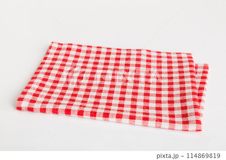 top view with red empty kitchen napkin isolated on table background. Folded cloth for mockup with copy space, Flat lay. Minimal style 114869819