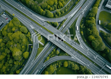 Shot of aerial capture of a highway interchange with a central railway line. Generative AI Shot of aerial capture of a highway interchange with a central railway line. Generative AI 114870745