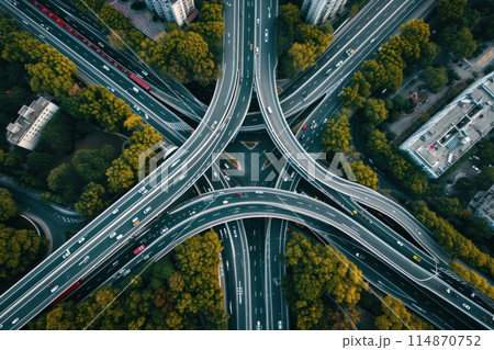 Shot of aerial capture of a highway interchange with a central railway line. Generative AI 114870752