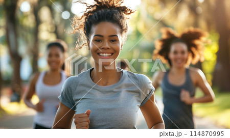 Group of Women Running in Park 114870995