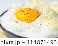 A cloud egg with a sprinkle of pepper on top 114871493