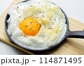A cloud egg with a sprinkle of pepper on top 114871495