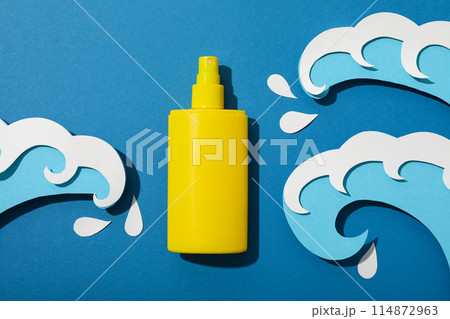 Means for safe tanning, on the background of the sea, flatlay. Means for safe tanning, on the background of the sea, flatlay. 114872963