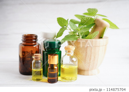 Alternative medicine herbal organic capsule with vitamin E omega 3 fish oil, mineral, drug with herbs leaf natural supplements for healthy good life. 114875704