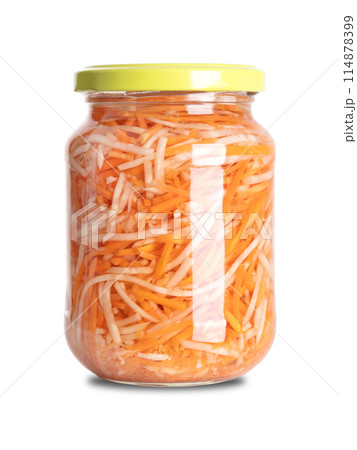 Pickled celeriac and carrot salad in a glass jar. Strips of celery root or knob celery, and carrot strips, pasteurized and preserved in vinegar brine, with salt and spices. Used as a side dish. Photo Pickled celeriac and carrot salad in a glass jar. Strips of celery root or knob celery, and carrot strips, pasteurized and preserved in vinegar brine, with salt and spices. Used as a side dish. Photo 114878399