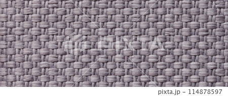 Texture of gray color background from woven textile material with wicker pattern, macro. Vintage grey fabric cloth 114878597