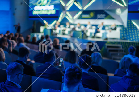 Audience attentively listening at a professional business conference 114880018