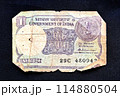 Rare Old Indian One rupee currency note on white background Rare Old Indian One rupee currency note on white background 114880504