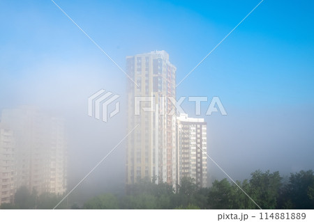 heavy fog in the city, modern high-rise buildings in the fog 114881889