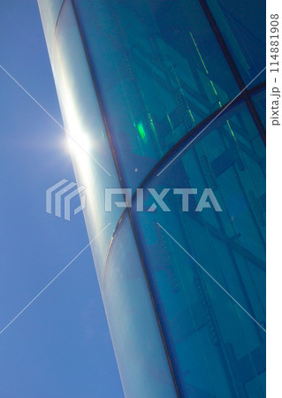Glass and steel - mirrored facade of modern office building 114881908