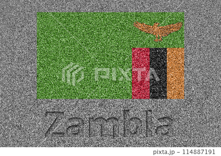 石板の上に描かれたザンビアの国旗と、掘ったような「Zambia」の文字 114887191