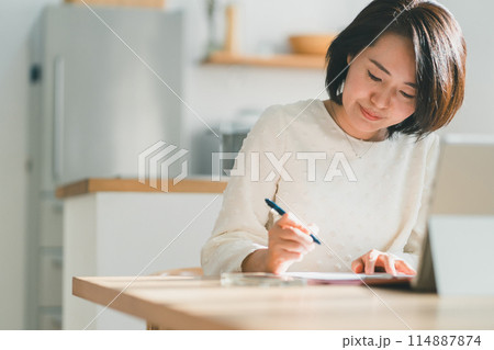 a forty-something woman a forty-something woman 114887874