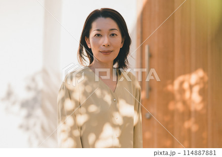 a forty-something woman a forty-something woman 114887881