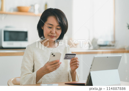 a forty-something woman a forty-something woman 114887886