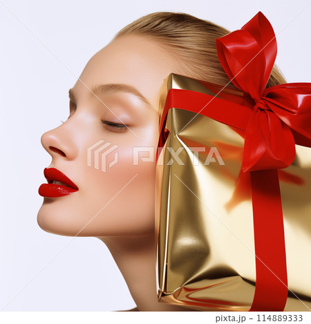 beautiful girl with a gift 114889333