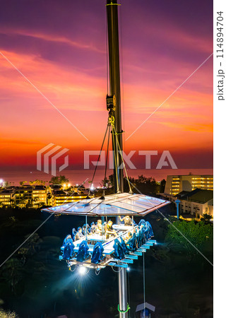 Aerial view of a dinner in the sky in Karon, Phuket, Thailand 114894704