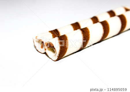 A picture of chocolate stick isolated on white background A picture of chocolate stick isolated on white background 114895059