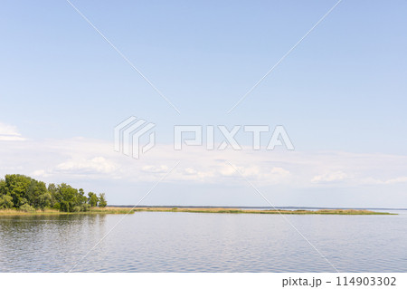 landscape, view of the shore of the reservoir, blue sky landscape, view of the shore of the reservoir, blue sky 114903302