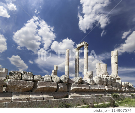Amman city landmarks-- old roman Citadel Hill, Jordan. Against the background of a beautiful sky with clouds 114907574