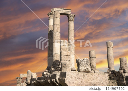Amman city landmarks-- old roman Citadel Hill, Jordan. Against the background of a beautiful sky with clouds 114907592