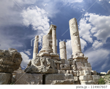 Amman city landmarks-- old roman Citadel Hill, Jordan. Against the background of a beautiful sky with clouds 114907607