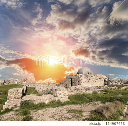 Amman city landmarks-- old roman Citadel Hill, Jordan. Against the background of a beautiful sky with clouds 114907638