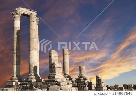 Amman city landmarks-- old roman Citadel Hill, Jordan. Against the background of a beautiful sky with clouds Amman city landmarks-- old roman Citadel Hill, Jordan. Against the background of a beautiful sky with clouds 114907649