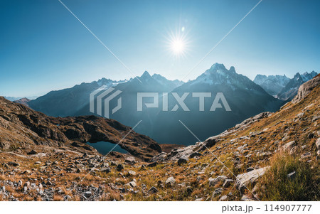 Landscape of Mont Blanc massif with Lac des Cheserys in autumn on daylight at Chamonix, France Landscape of Mont Blanc massif with Lac des Cheserys in autumn on daylight at Chamonix, France 114907777