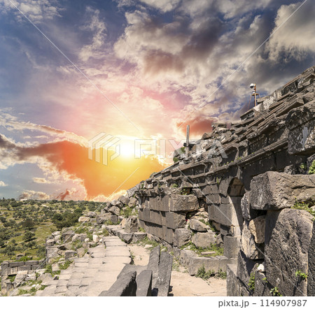 West Theatre of Umm Qais (Umm Qays)--is a town in northern Jordan near the site of the ancient town of Gadara, Jordan. Against the background of a beautiful sky with clouds 114907987
