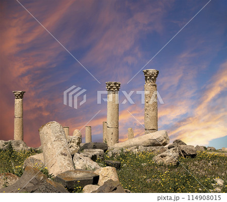 Roman ruins at Umm Qais (Umm Qays)--is a town in northern Jordan near the site of the ancient town of Gadara, Jordan. Against the background of a beautiful sky with clouds 114908015
