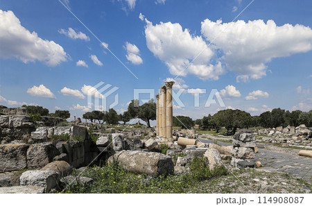 Roman ruins at Umm Qais (Umm Qays)--is a town in northern Jordan near the site of the ancient town of Gadara, Jordan. Against the background of a beautiful sky with clouds 114908087