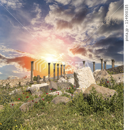 Roman ruins at Umm Qais (Umm Qays)--is a town in northern Jordan near the site of the ancient town of Gadara, Jordan. Against the background of a beautiful sky with clouds 114908185