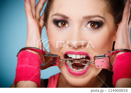 teen crime - teenager girl in handcuffs teen crime - teenager girl in handcuffs 114908658