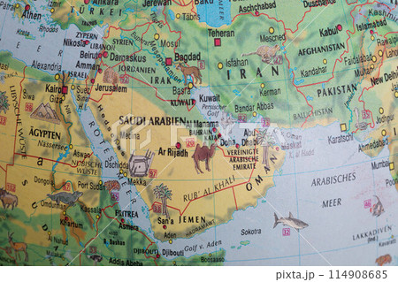 Globe close up. Map of continents - Arabian peninsula. An indispensable device for geography lessons. 114908685